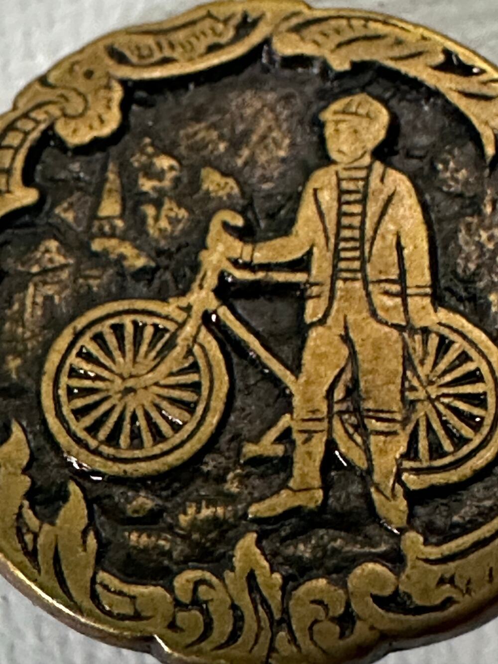 Vintage Brass Button Man Standing Next to Bicycle